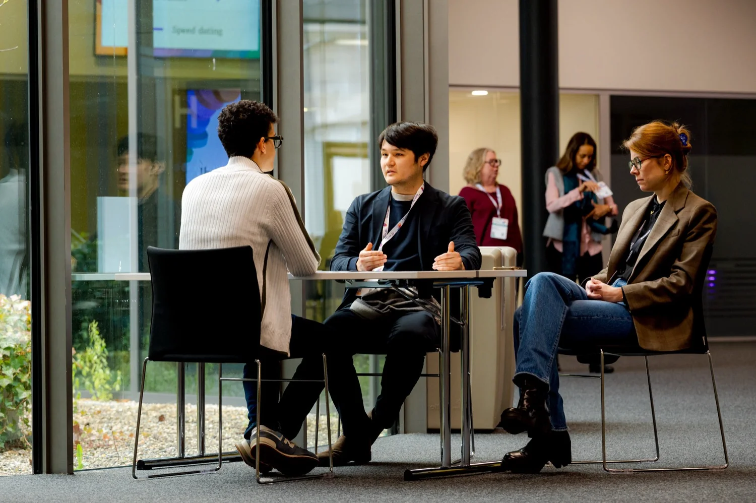 Participants networking at the AMLD Intelligence Summit